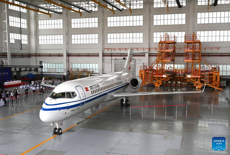 An ARJ21 passenger aircraft, the 2,000th aircraft leased by the Dongjiang Free Trade Port Zone (DFTP), parks at the Tianjin Binhai International Airport in north China's Tianjin, July 29, 2022. DFTP launched the aviation leasing business in 2009. It now has developed into the world's second-largest aviation leasing hub, after Ireland, in terms of the overall asset volume. (Xinhua/Zhao Zishuo)
