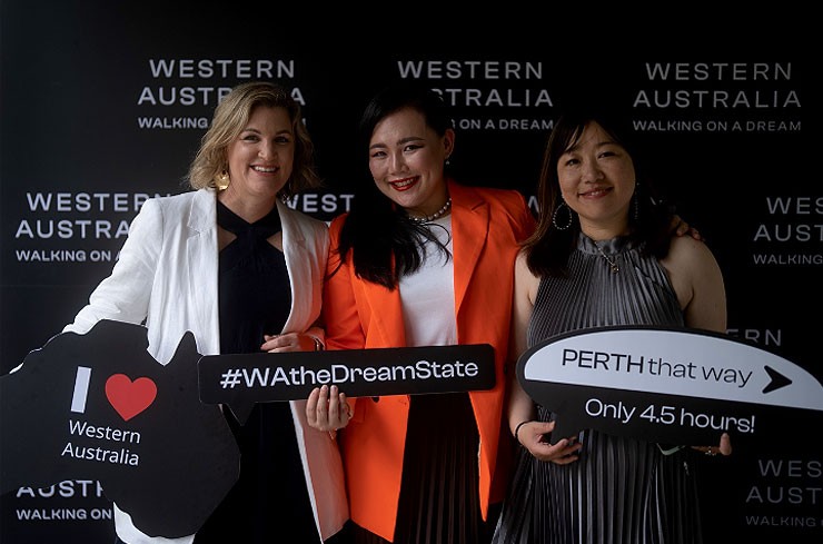 From left: Tourism Western Australia's Ava Ang, Country Manager, Singapore & Malaysia; Melissa Forbes, Acting Executive Director, Marketing and Vivienne Li, Senior Manager - Eastern Hemisphere Markets posing next to a whale shark.