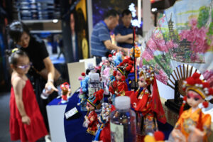 Visitors look at cultural products at Jiangsu exhibition area at the 10th West China Culture Industries Expo in Xi’an, Shaanxi province, on Aug 17, 2023. [Photo/Xinhua]