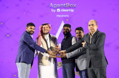 Ayyappan R., CEO, Cleartrip along with Alhasan Aldabbagh, President of APAC markets, Saudi Tourism presenting an award to a Travel Agency (1)